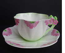 Dainty Floral Handled cup and saucer 12096